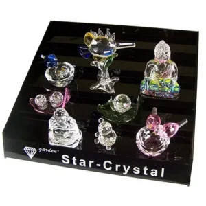 Svart trappstegsdisplay med små dekorativa Star Crystal-figurer för aromaterapi