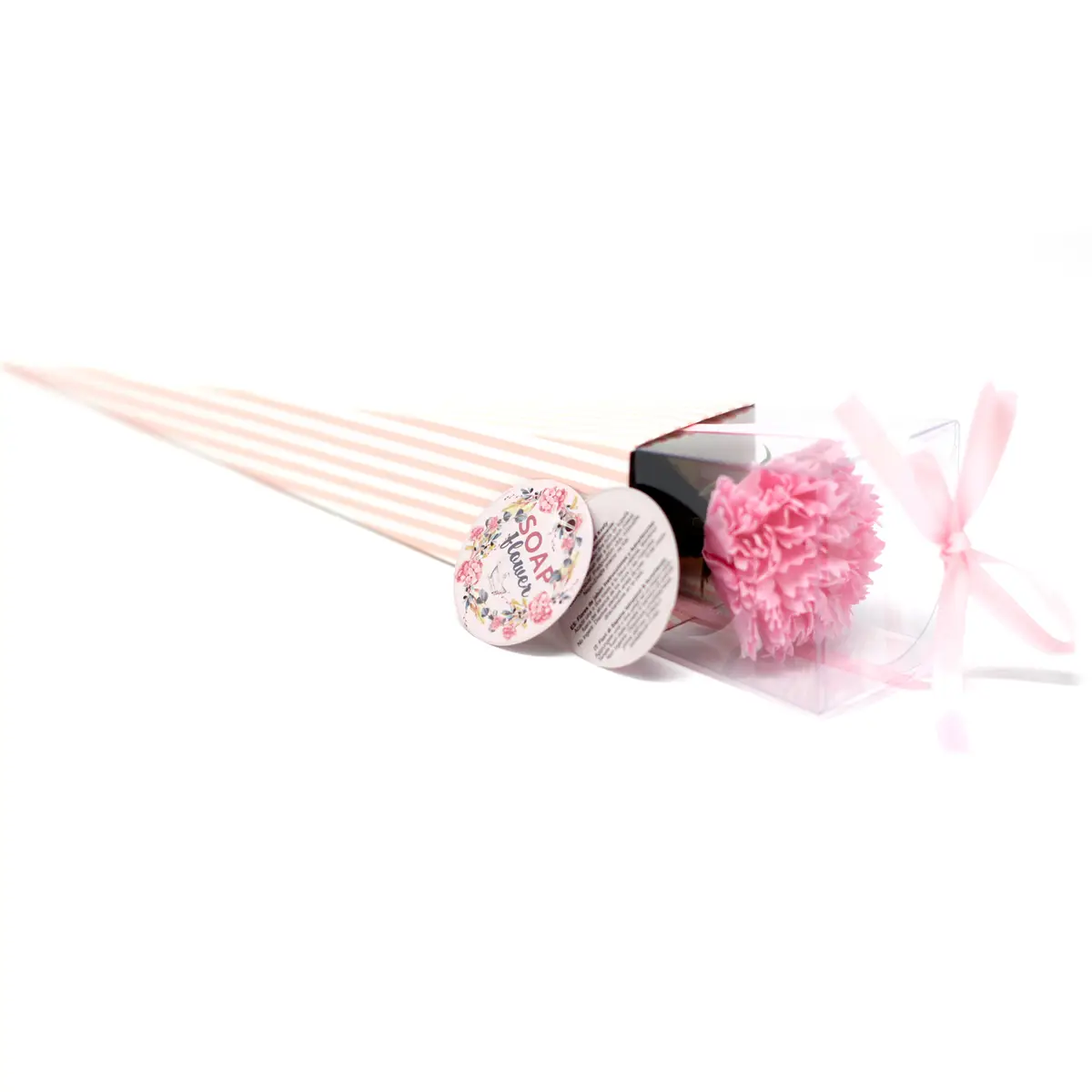 Medium rosa nejlika i presentförpackning med dekorativt omslag och rosett