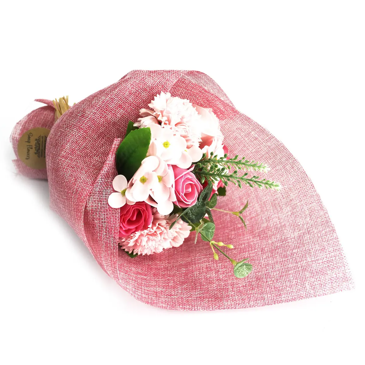 Rosa tvålbukett med tvålblommor insvept i rosa tyg