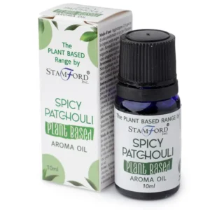 Flaska med växtbaserad doftolja och förpackning med kryddig patchouli doft