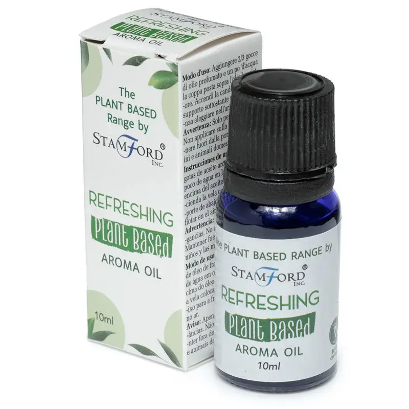 Flaska med växtbaserad doftolja Refreshing 10 ml och dess förpackning