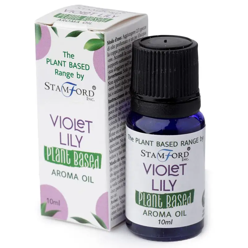 Blå glasflaska med växtbaserad doftolja Violet Lily och vit förpackning med lila och gröna detaljer