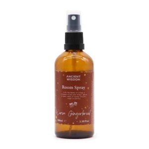 Flaska med Warm Gingerbread rum- och kuddspray med julig etikett