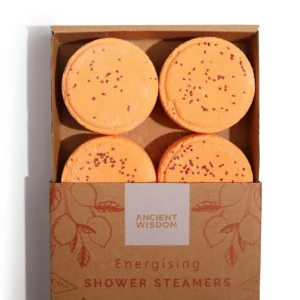 Fyra orange duschångor i en brun presentförpackning med texten Ancient Wisdom