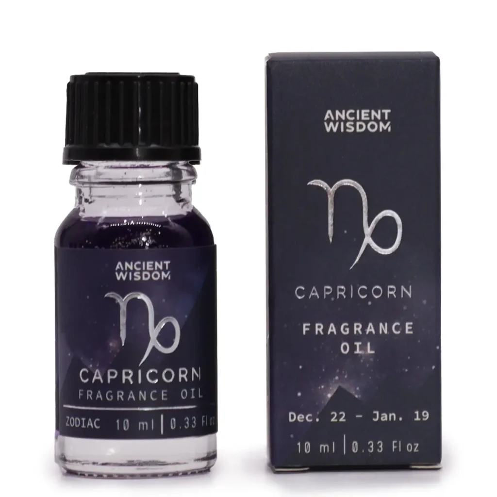 Flaska och förpackning för Zodiakdoftolja Capricorn med lila färg och glitter