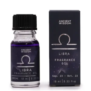 Flaska och förpackning med Zodiakdoftolja Libra i lila färg med glitter