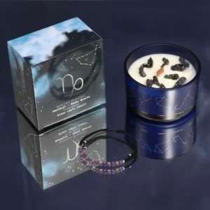 Zodiakljus i blå glasburk med stjärntecken och armband med ametist och rökkvarts