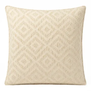 Kuddfodral i creme med geometriskt mönster och vävd textur