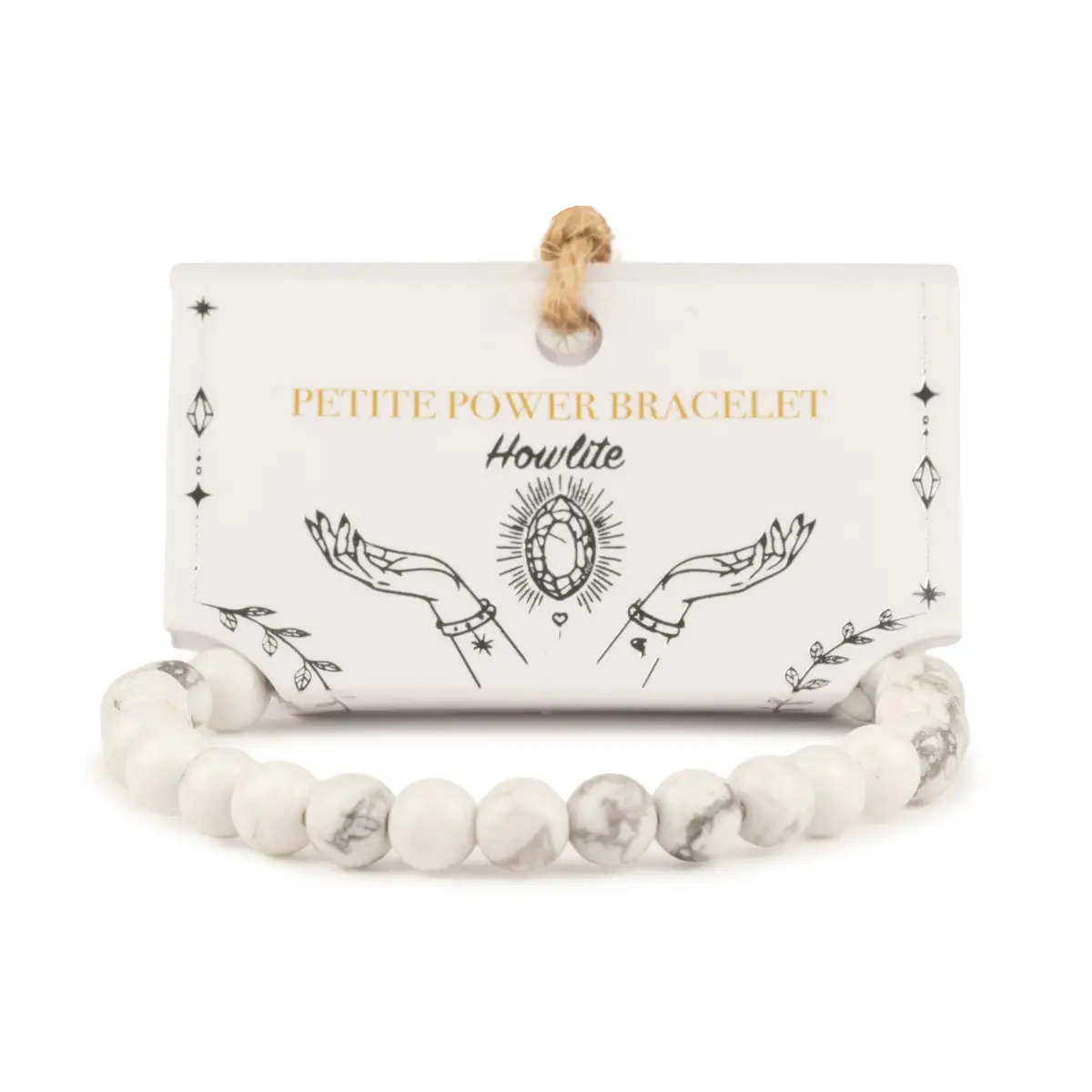 Petite armband med vita och grå marmorerade howlitpärlor på illustrerat presentkort