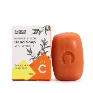Orange vitamin C handtvål bredvid vit och orange förpackning med text och illustration av citrusfrukter